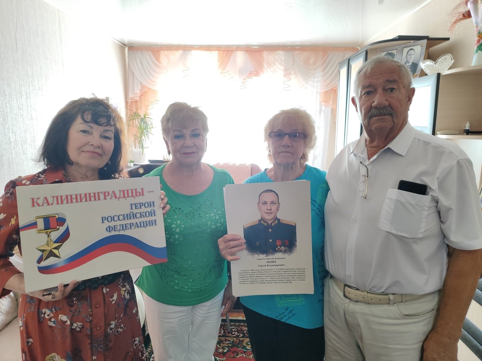 Был патриотом: участники автопробега встретились с матерью Героя России